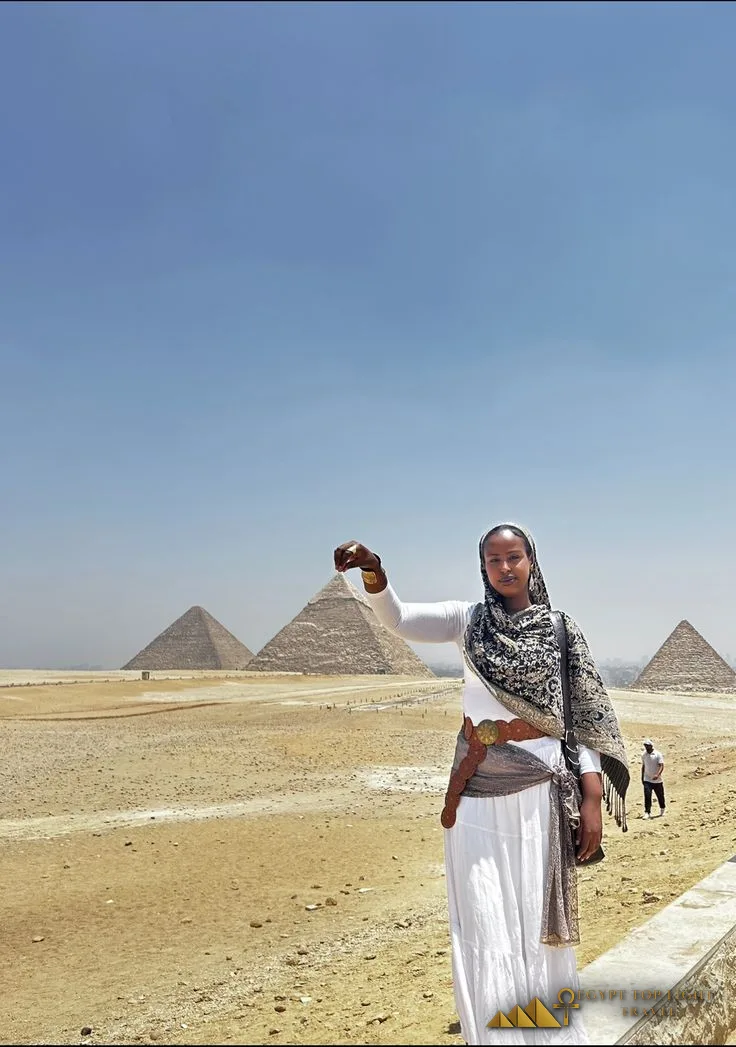 Three friends smiling in front of the Great Sphinx