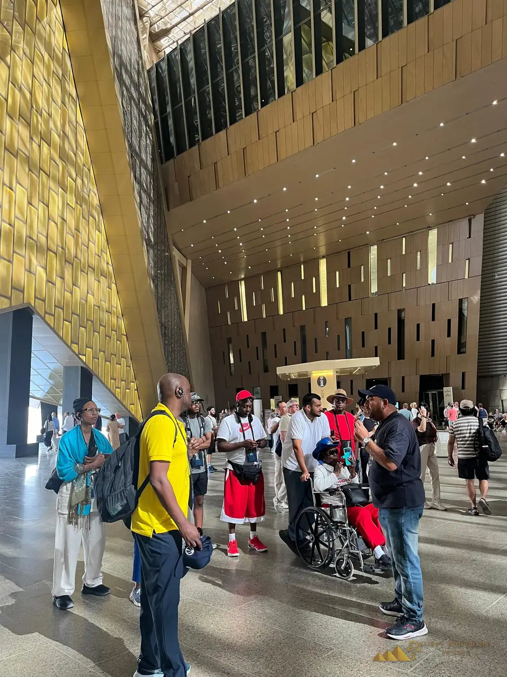 Our guests inside the Grand Egyptian Museum with their Egyptologist